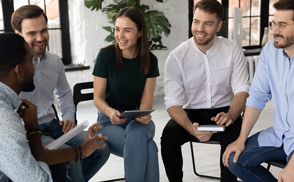 smiling colleagues in a workshop