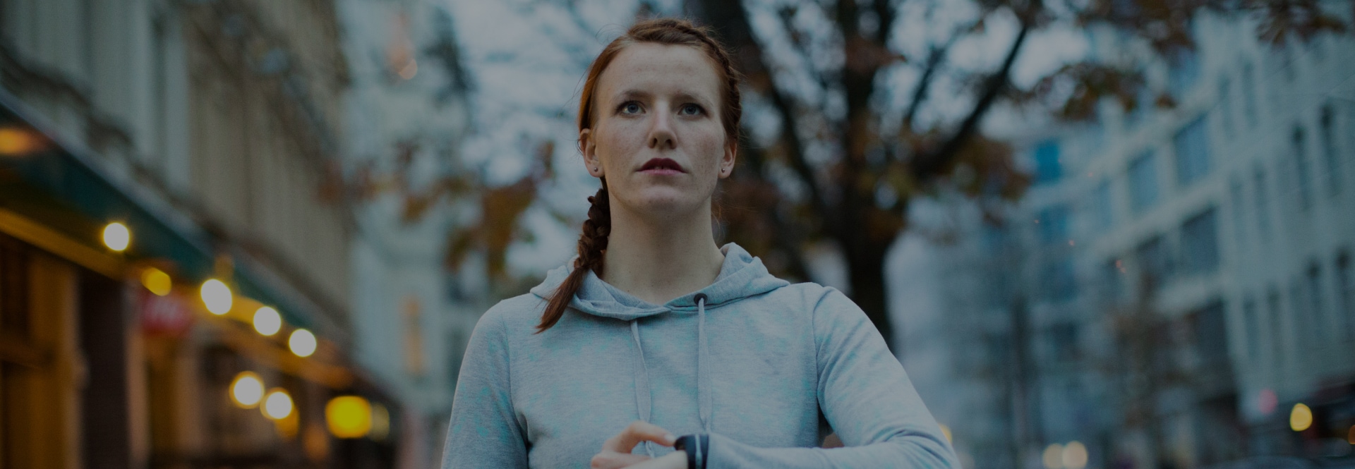  Sporty woman checking smartwatch