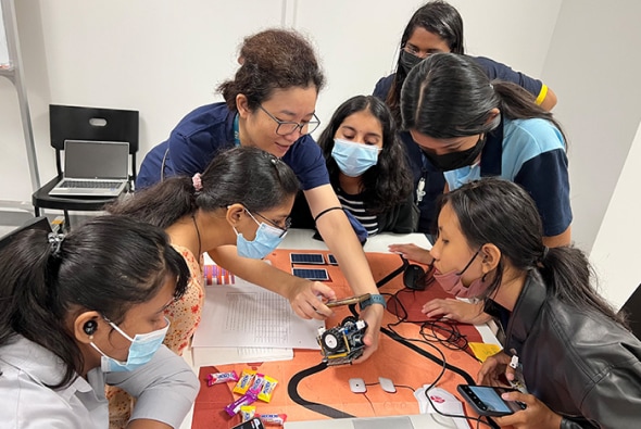 Group of women at STMicroelectronics' STEM program