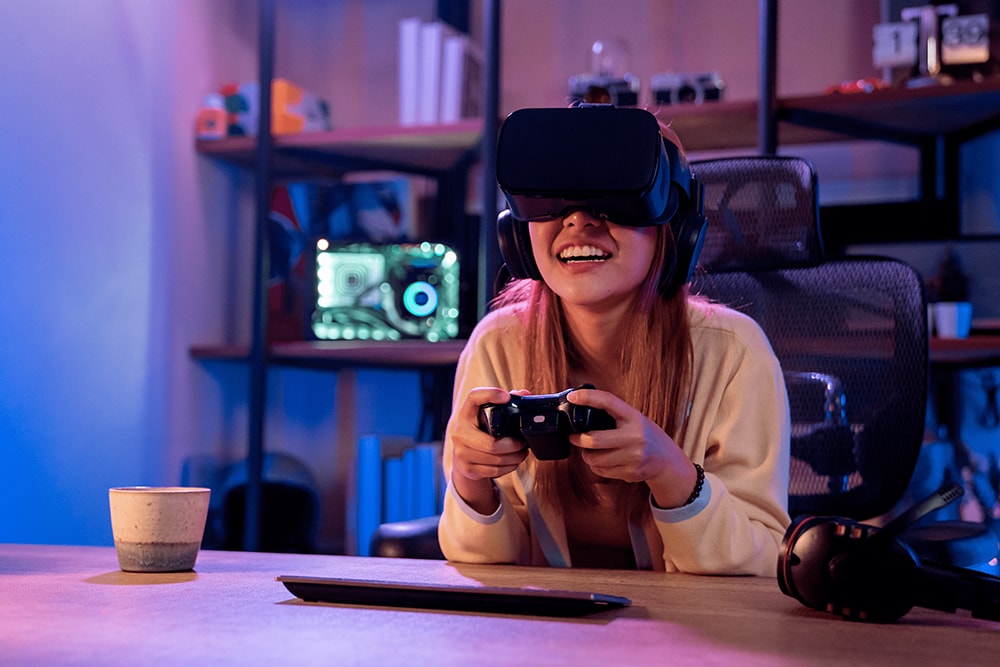 Image of a person wearing headphones and holding a game controller