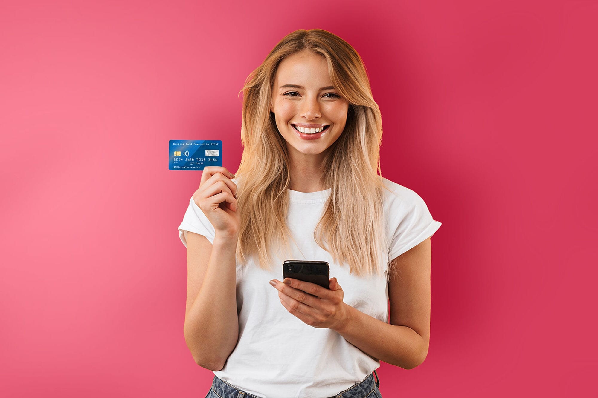 A person using a contactless card reader on a yellow ticket validation machine inside public transportation.