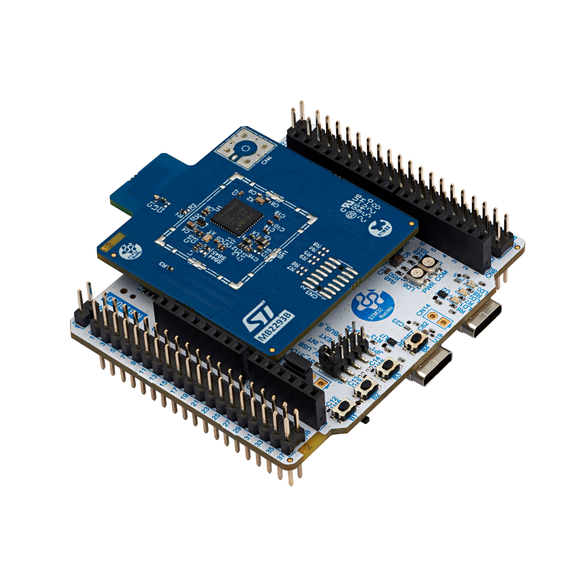Stacked STMicroelectronics evaluation boards with pin headers.