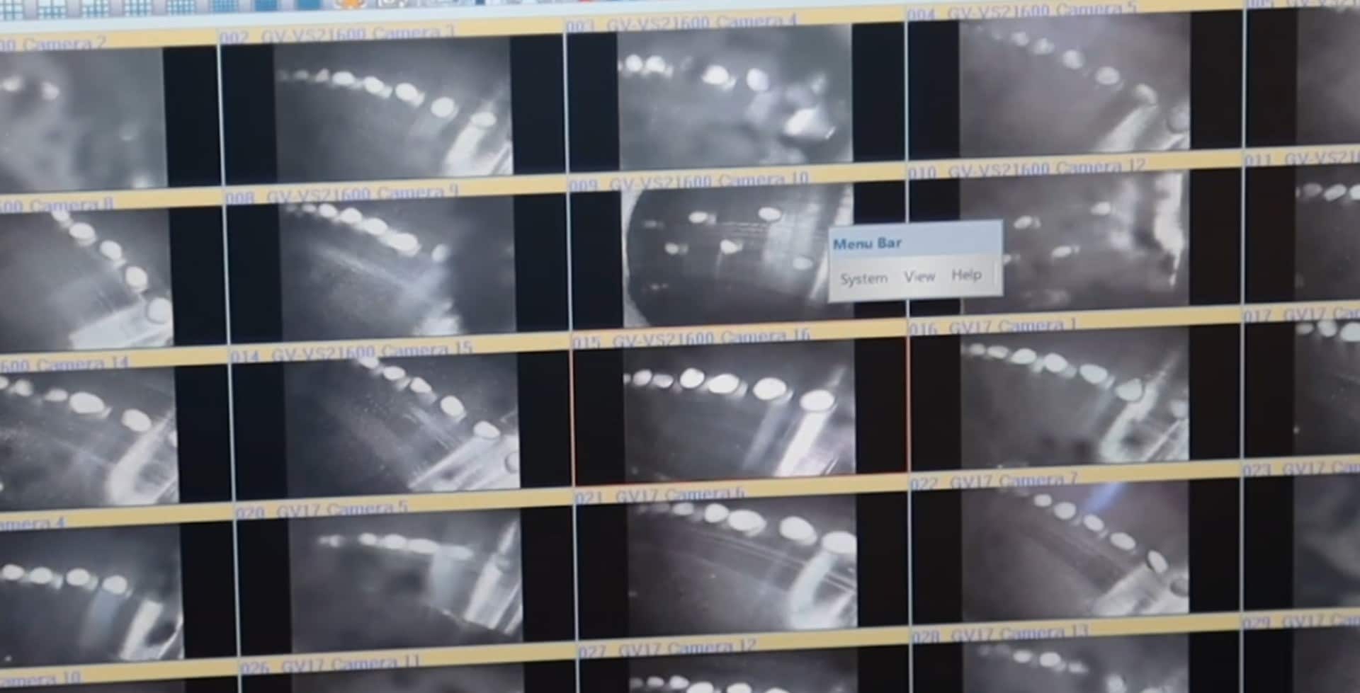 Grid of low-resolution, blurred camera views of spinning seeding discs