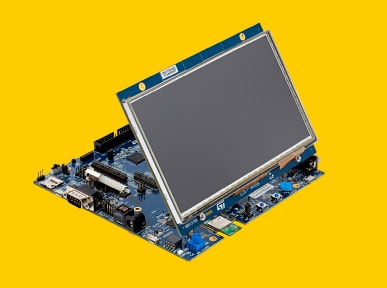 STMicroelectronics Evaluation Board featuring an angled LCD display for complete application testing