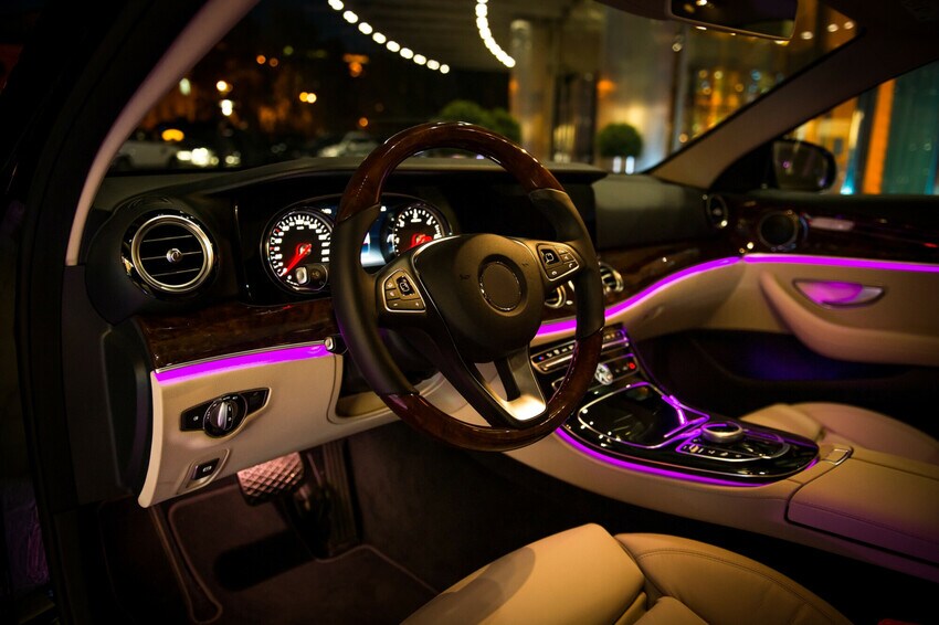 interior of a prestige car with various electronics