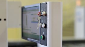 Industrial control panel with button and screen interface
