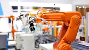 Robotic arm in a precision production process
