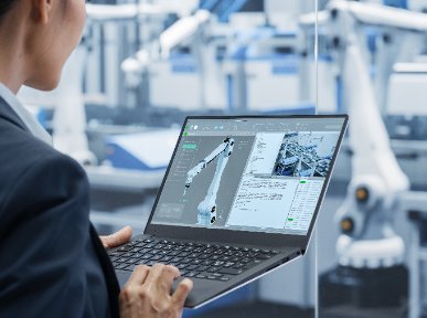 Professional controlling an automated robotic system from a laptop